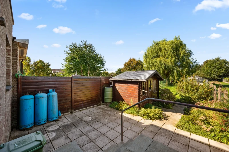 Charmante rijwoning met 2 slpk, tuin en parking